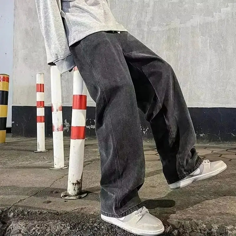 Black and light blue loose streetwear jeans for men by Ansoff, featuring a straight wide-leg fit in Korean fashion style.