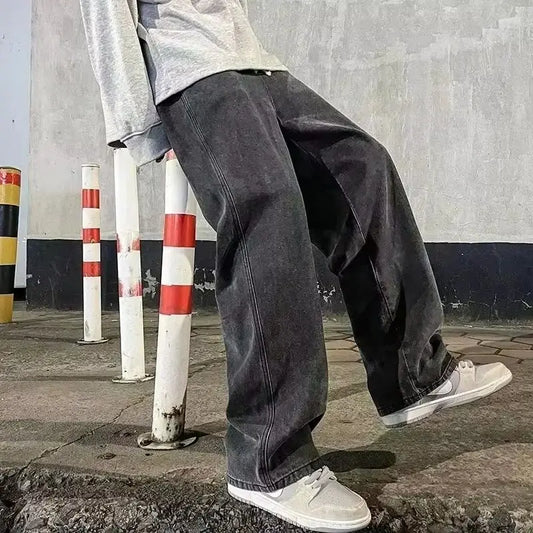 Black and light blue loose streetwear jeans for men by Ansoff, featuring a straight wide-leg fit in Korean fashion style.