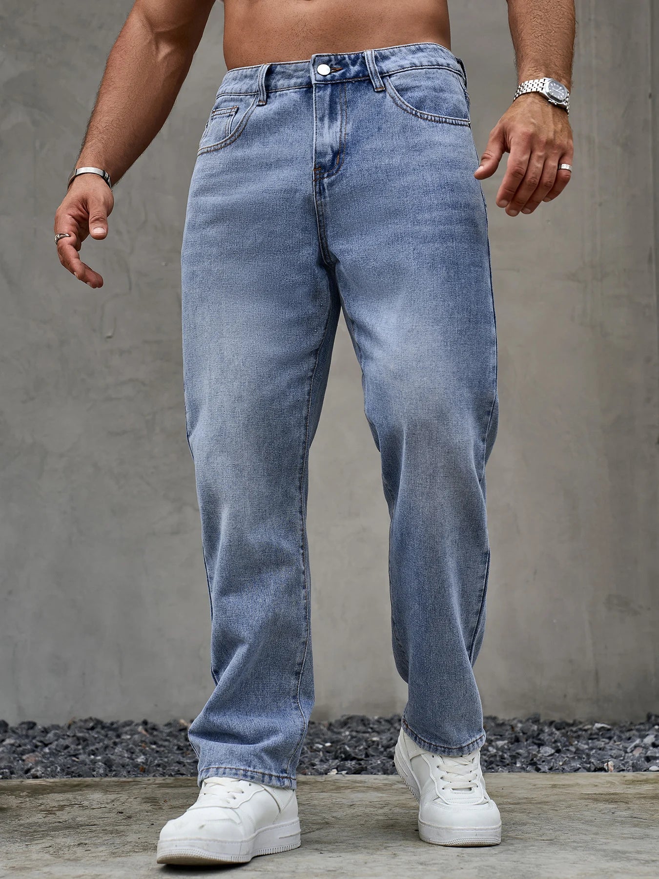 Men's loose fit blue denim jeans by Ansoff with straight leg cut, soft durable fabric, ideal for casual all-season wear.