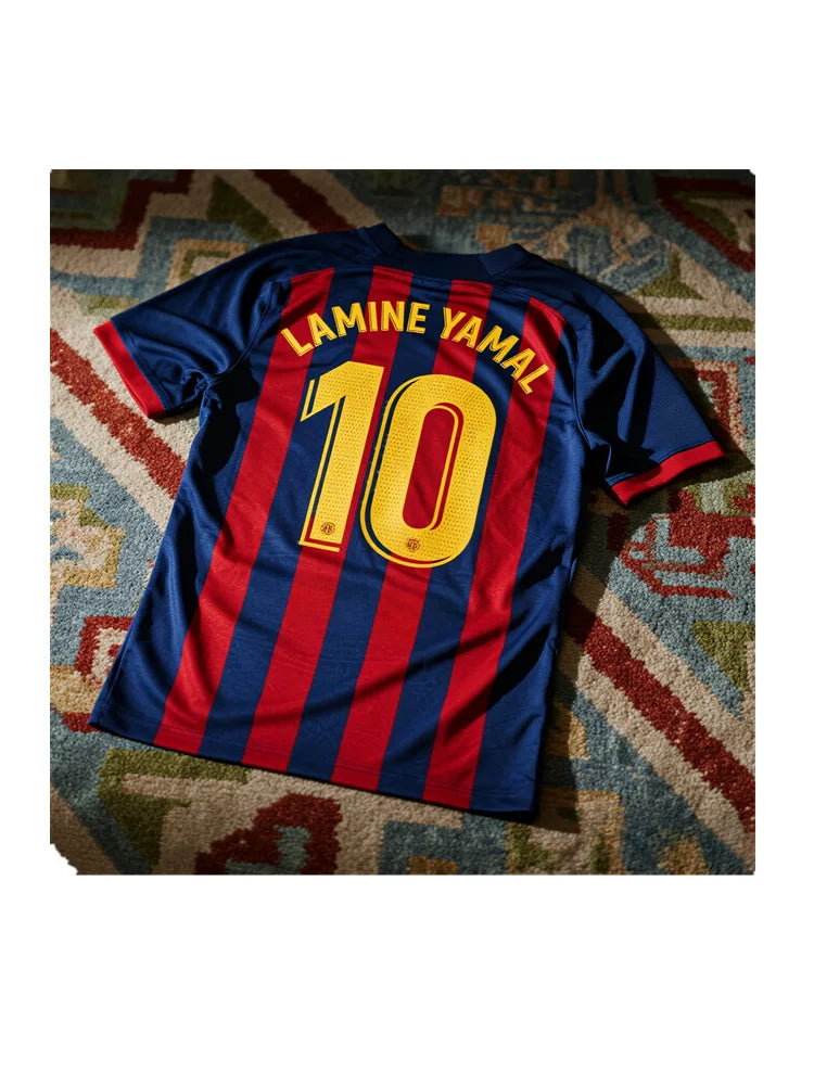 Ansoff Lamine Yamal soccer jersey with blue and red stripes, featuring player name and number 10, on a plain background.