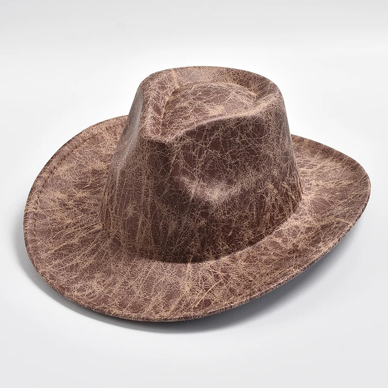 Vintage cowboy hat by Ansoff featuring faux leather, wide brim, and classic western style for men and women.