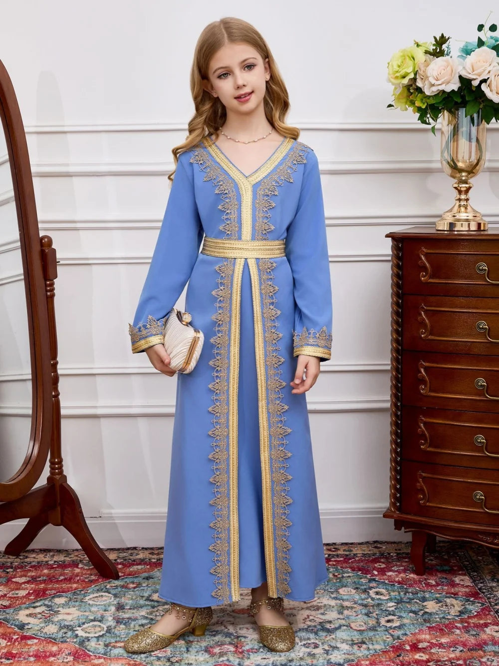 Girls blue Muslim dress by Ansoff featuring gold lace embroidery, long robe style, V-neck, belt, perfect for Eid and parties.
