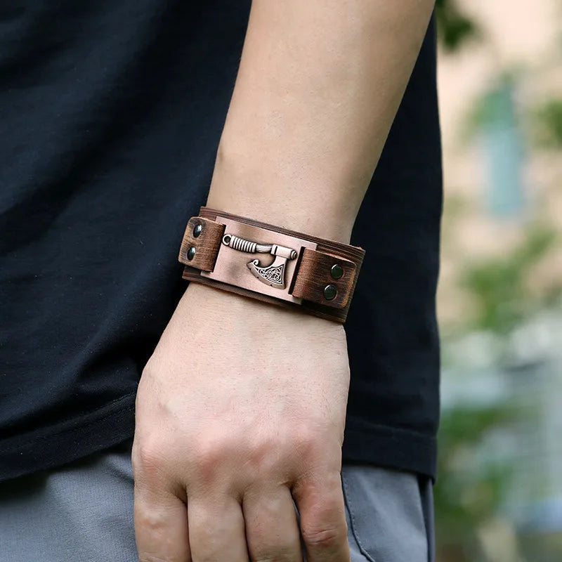 Ansoff VOQ retro Nordic Viking tomahawk leather bracelet with wide adjustable bangle design and punk-style details.