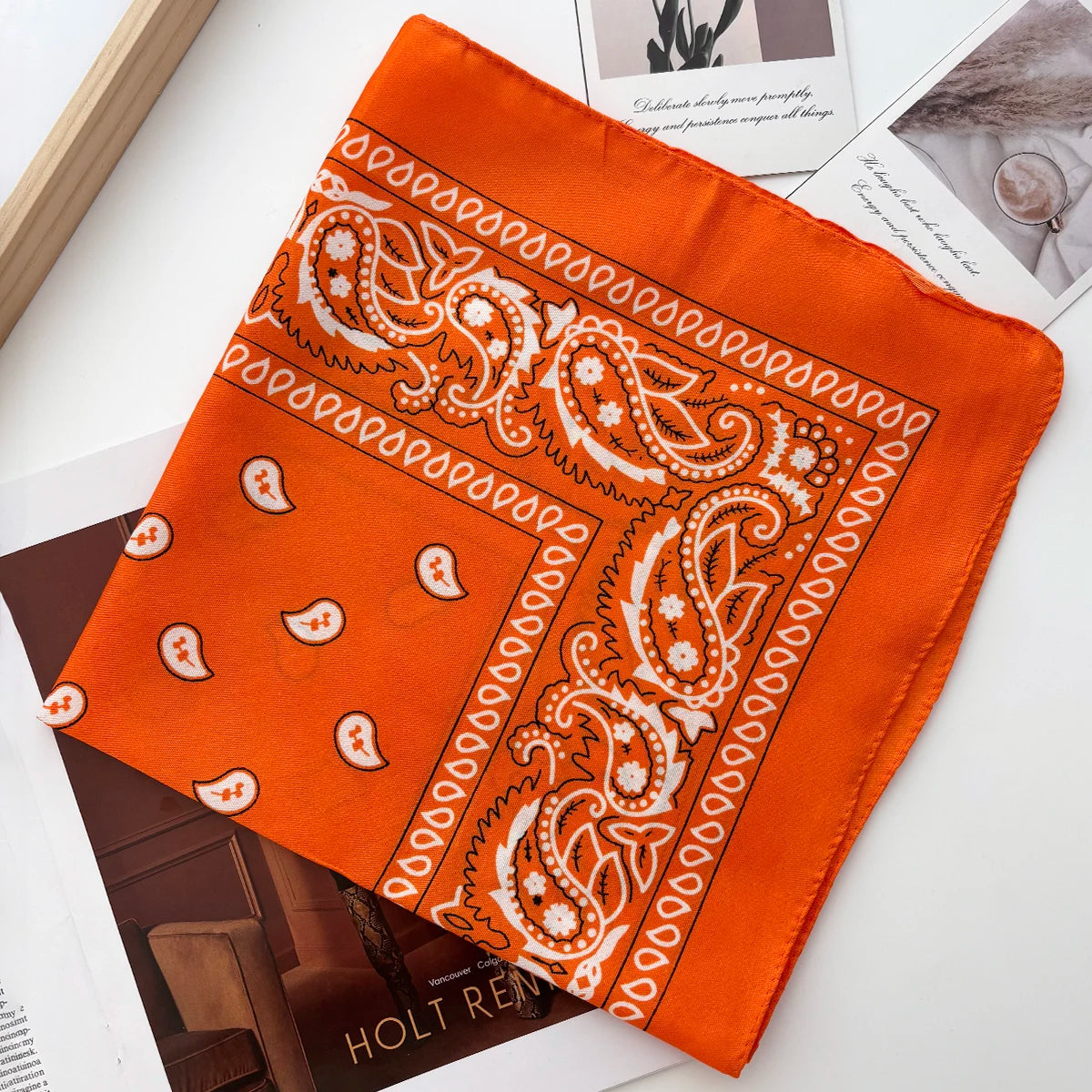 Unisex Ansoff bandana hairband with paisley pattern, cowboy and biker style headwear, worn as a head wrap or wrist accessory.