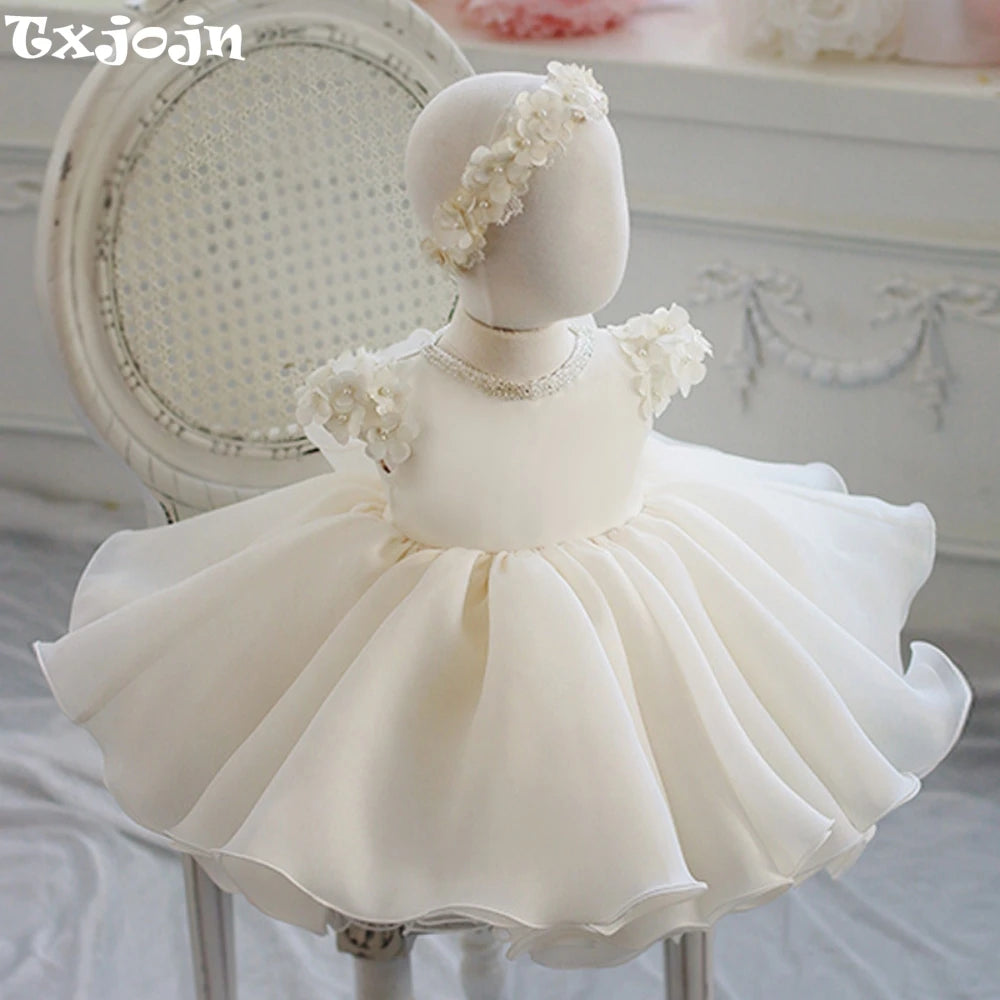White 3D flower princess gown for girls by Ansoff, perfect for weddings, parties, and piano performances, featuring a classic O-neck design.