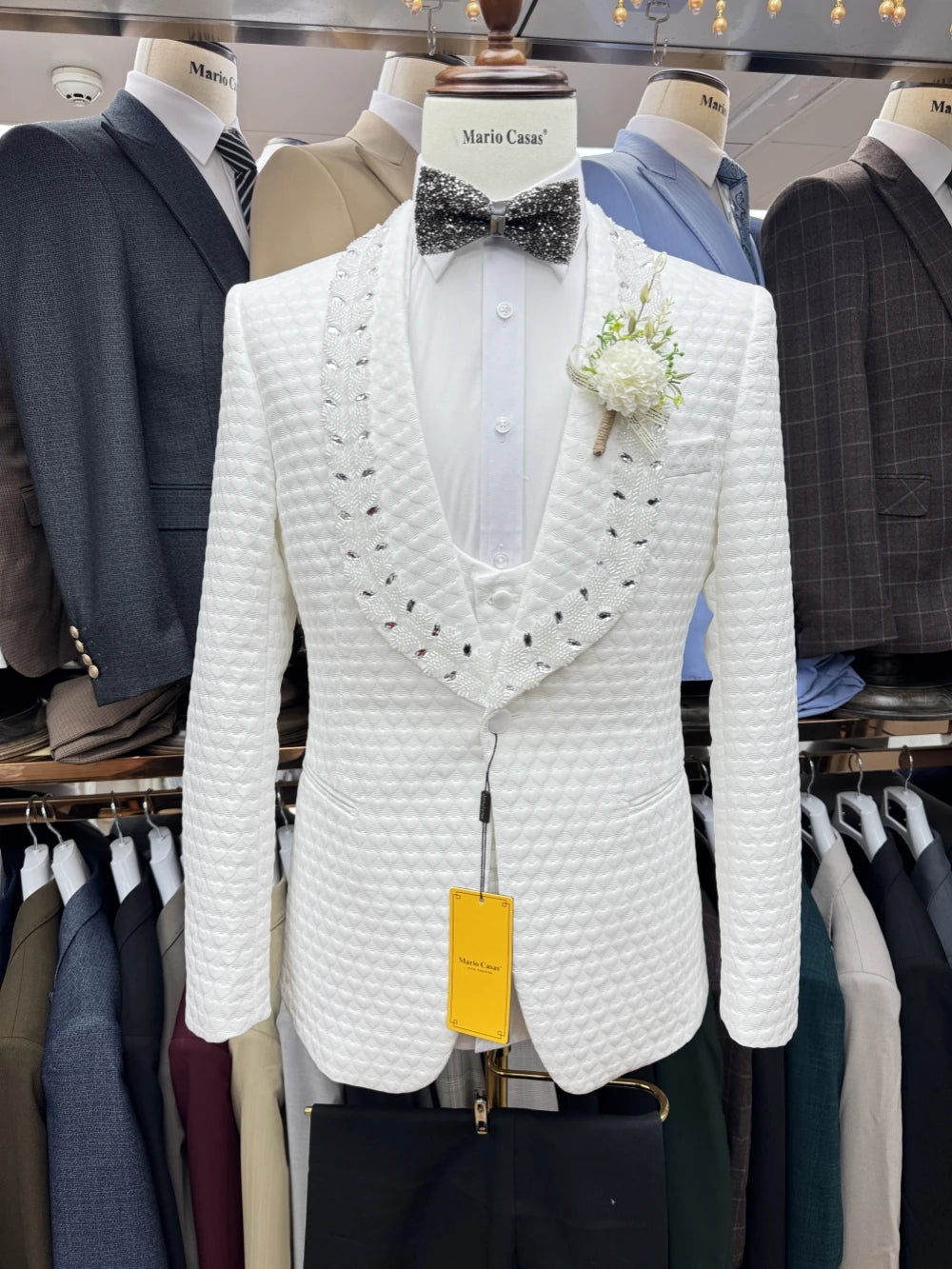 White Jacquard men's tuxedo set with blazer, vest, and pants by Ansoff, ideal for weddings, formal events, or special occasions.