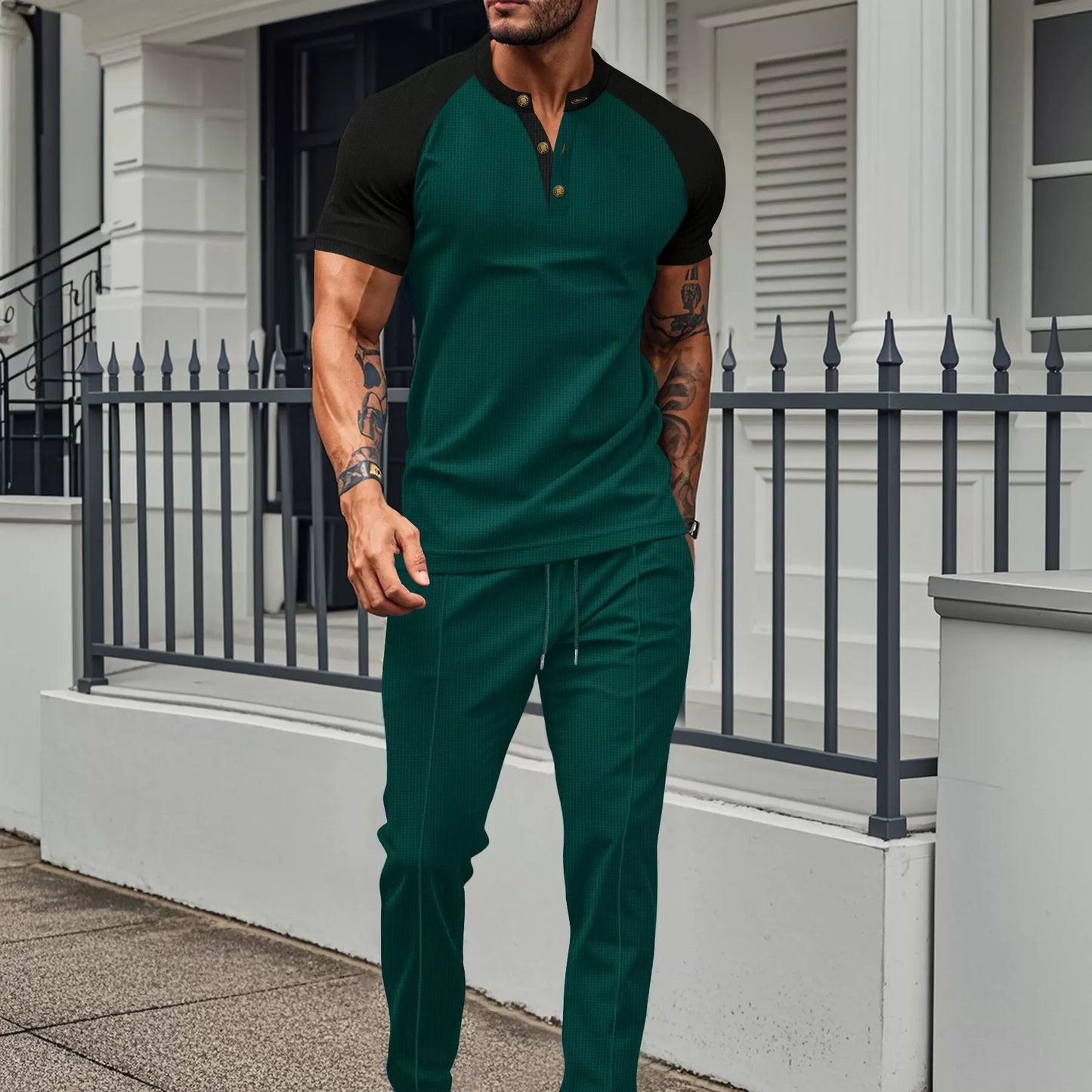 Men's summer suit set by Ansoff featuring a casual round neck short sleeve T-shirt and matching trousers in lightweight fabric.