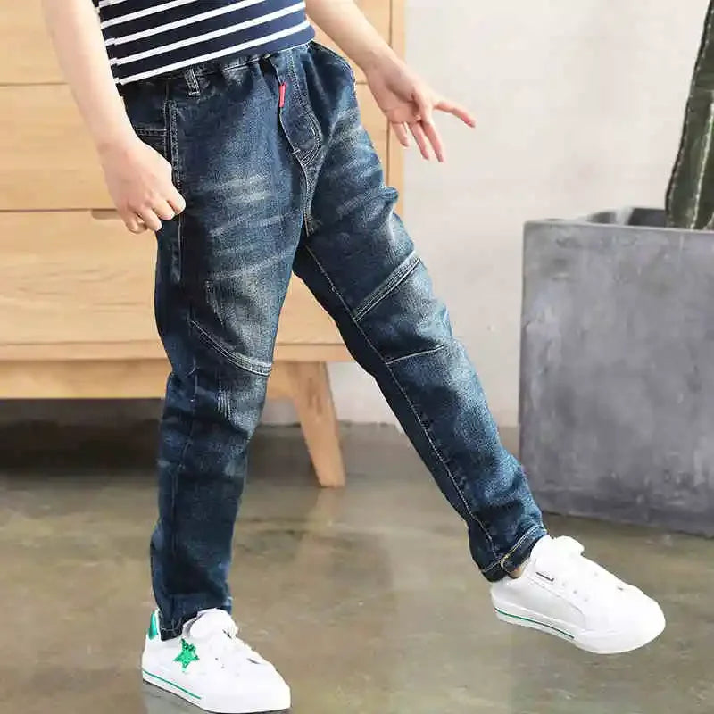 Ansoff boys' denim jeans featuring cowboy style, casual fit, suitable for children ages 4 to 12, shown in a natural pose.