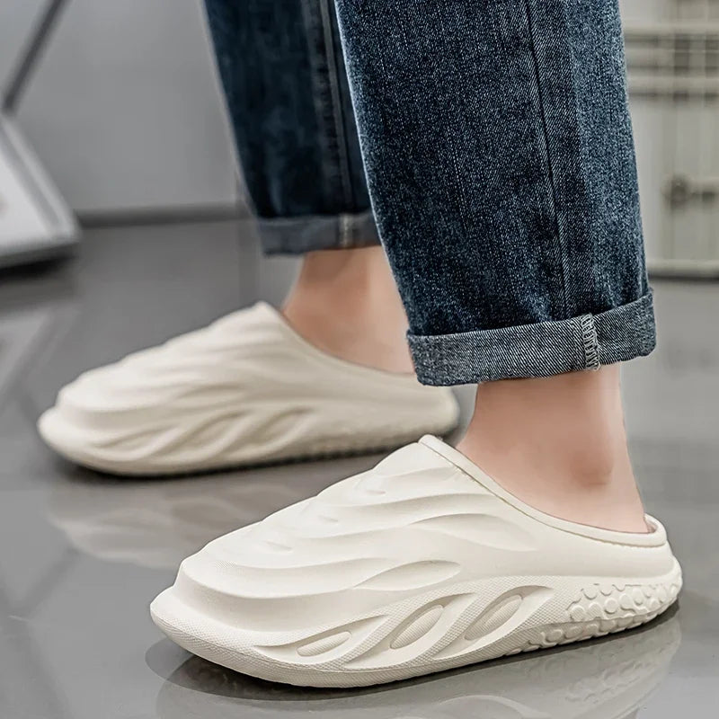 Ansoff men's waterproof velvet slippers with non-slip soles and warm interior, ideal for home wear and couples.