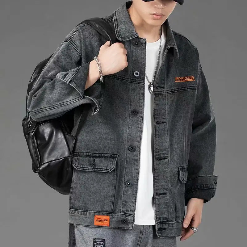 Men's denim jacket by Ansoff, casual streetwear jeans jacket with a loose fit, Korean style hip hop outerwear in blue denim.