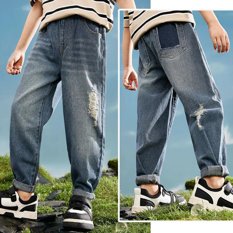 Kids' denim cowboy jeans by Ansoff, boys' casual sports trousers with pockets and belt loops, available in sizes 4 to 12.