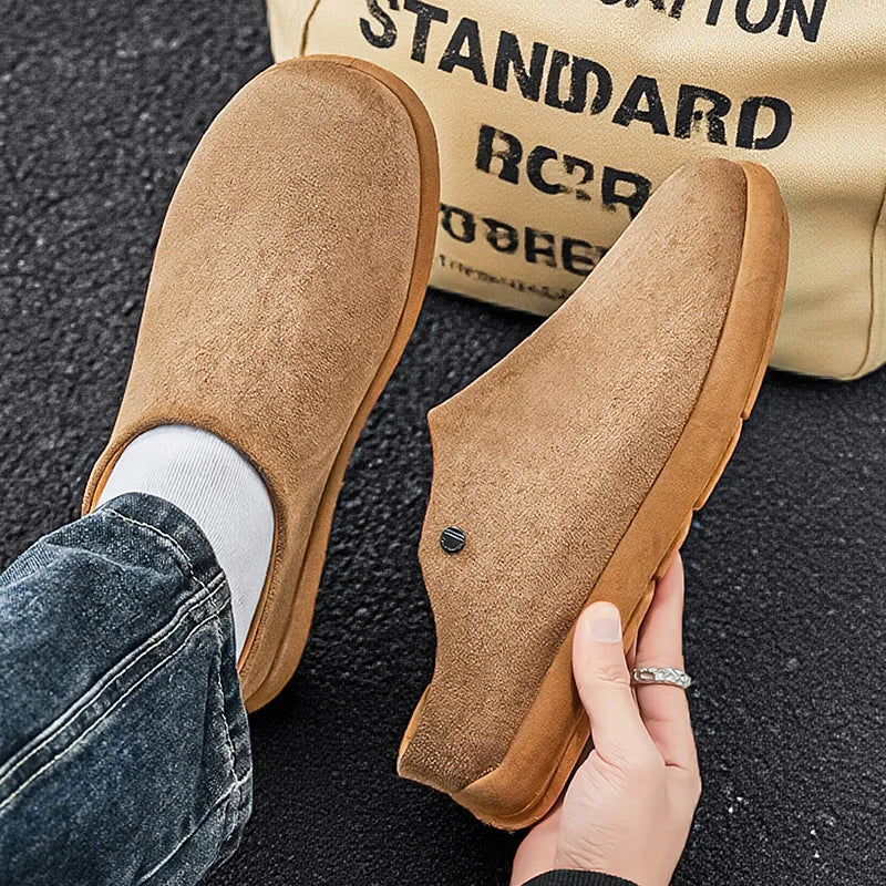 Men's suede leather slippers with arch support, cork soles, and cozy winter design, featuring a stylish mule style by Ansoff.