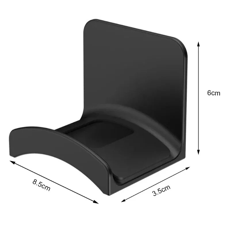 Ansoff universal headphone stand wall mount hanger supporting gaming earphones and headsets on a plastic under-desk rack.